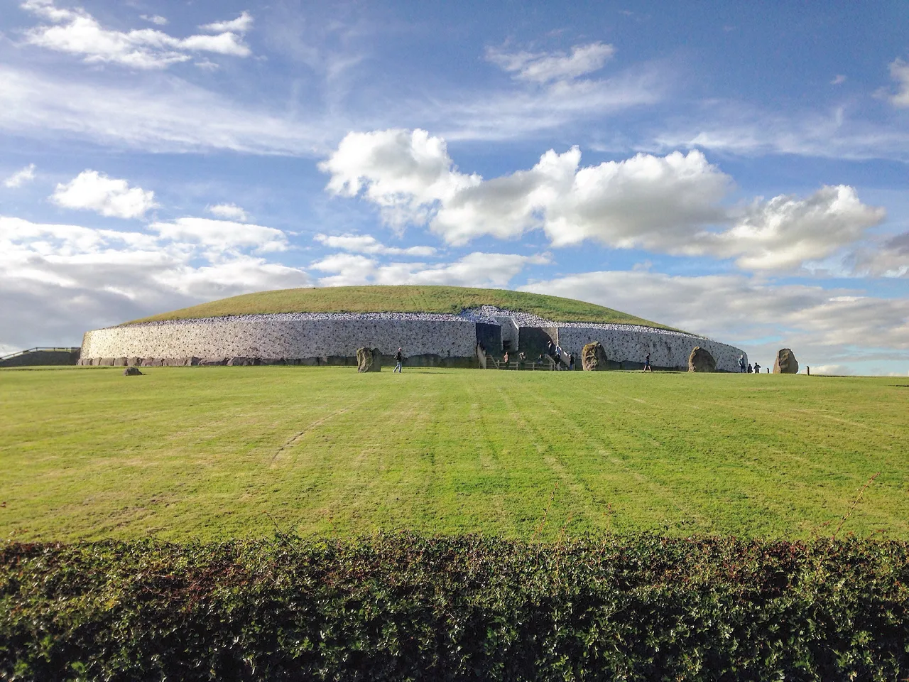 The white quartz facade of the Newgrange monument and the roof-box above the entrance