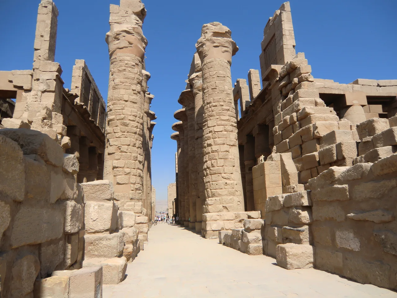 The densely set giant stone columns with papyrus capitals of Karnak's Great Hypostyle Hall