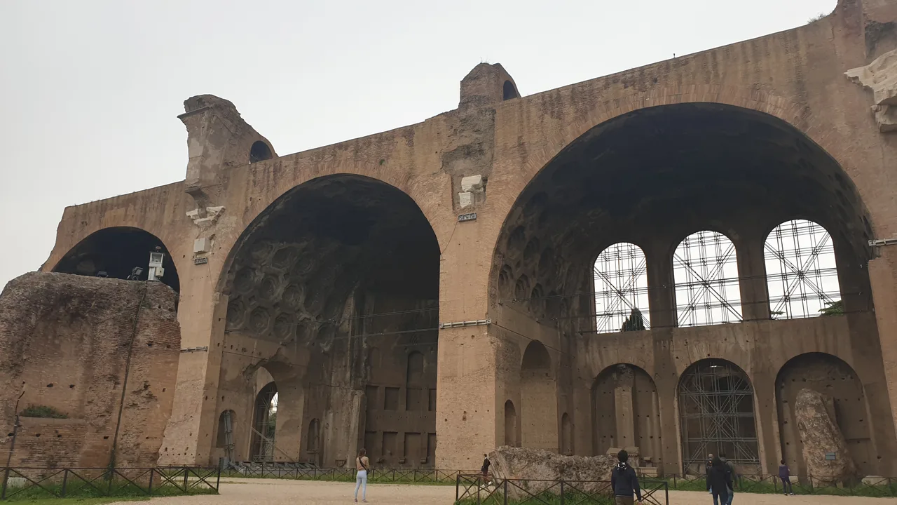 The surviving three giant barrel-vaulted side aisle bays of the Basilica of Maxentius, with their coffered soffits