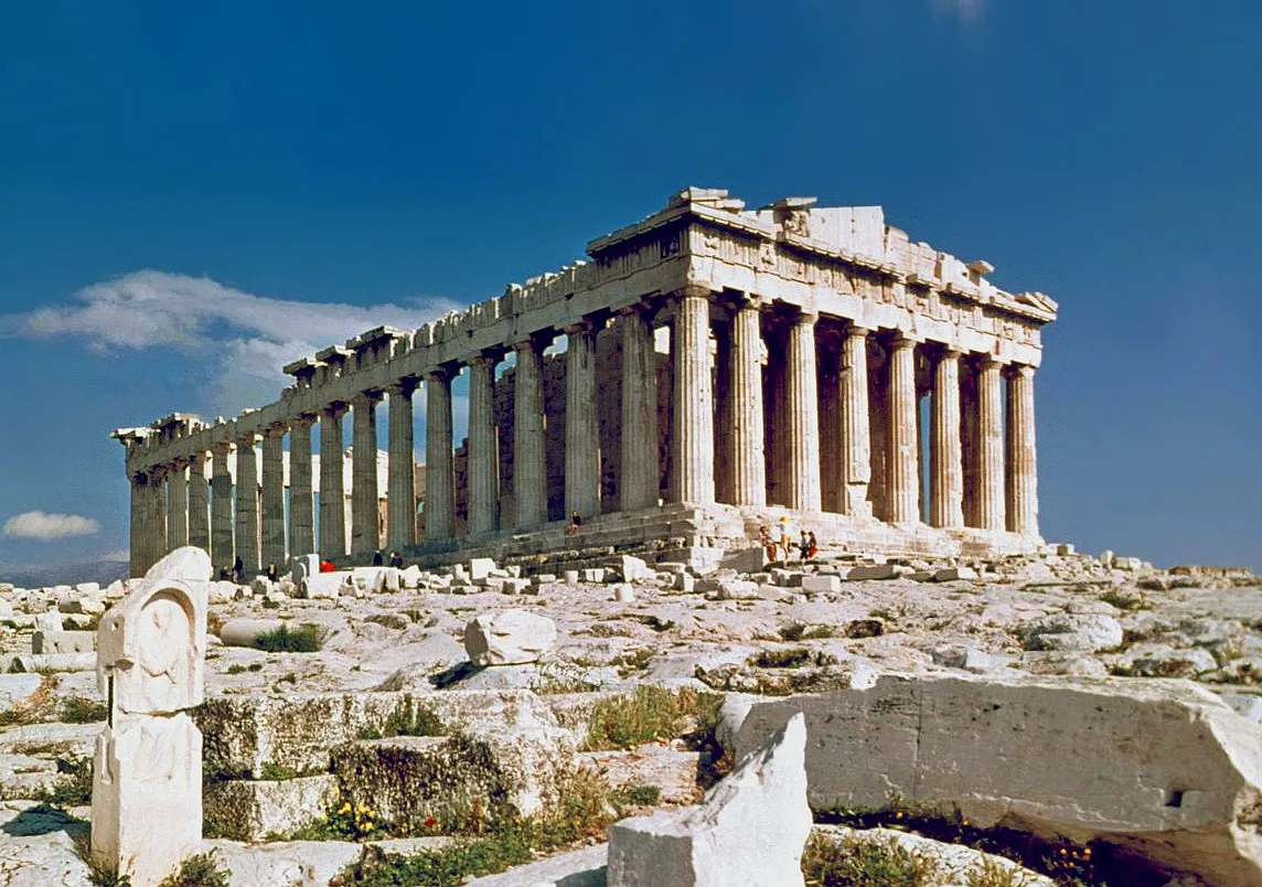 The Doric-columned facade and triangular pediment of the Parthenon on the Acropolis