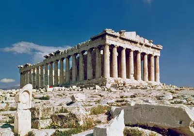 The Doric-columned facade and triangular pediment of the Parthenon on the Acropolis