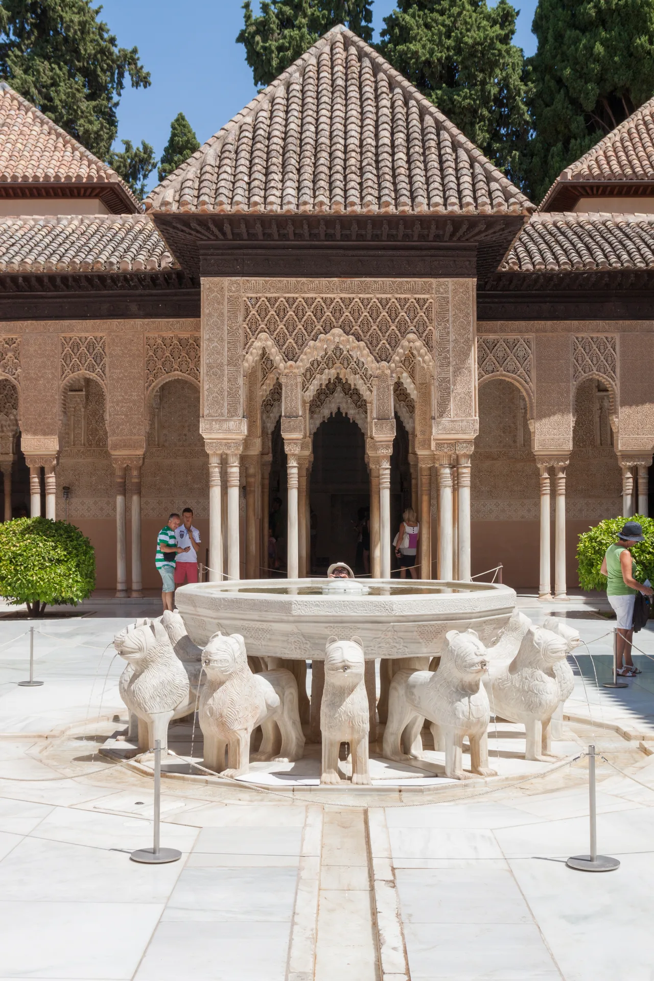 The lion-figured fountain at the centre of the Court of the Lions at the Alhambra, ringed by columns