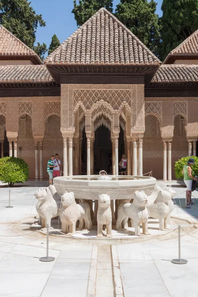 The lion-figured fountain at the centre of the Court of the Lions at the Alhambra, ringed by columns