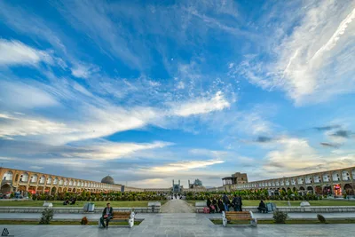 A panorama of Naqsh-e Jahan Square; at one end the turquoise-tiled double-shell dome and minarets of the Shah Mosque