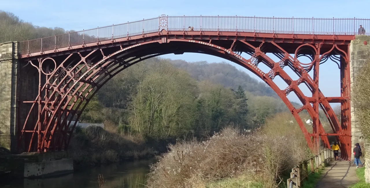 The cast-iron arch ribs of the Iron Bridge over the River Severn