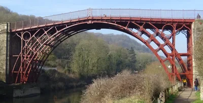 The cast-iron arch ribs of the Iron Bridge over the River Severn