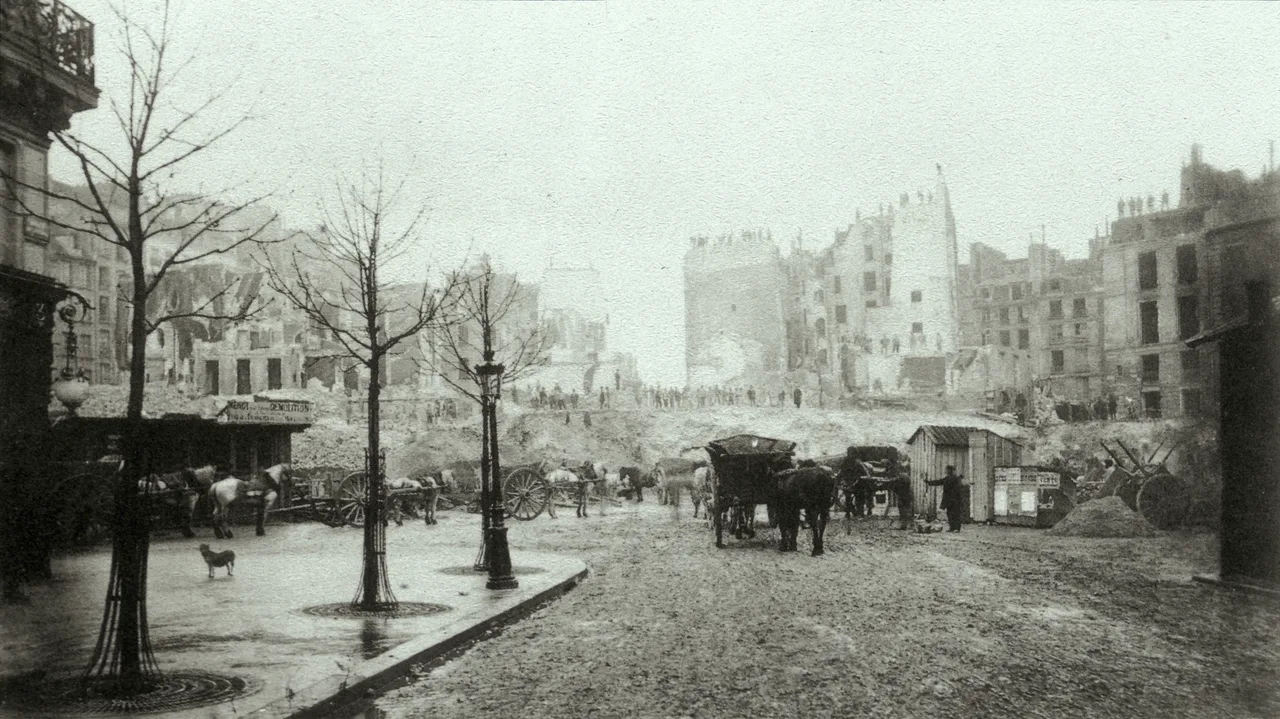 The Butte des Moulins being cut away for the Avenue de l'Opéra: opened ground on the slope and houses under demolition