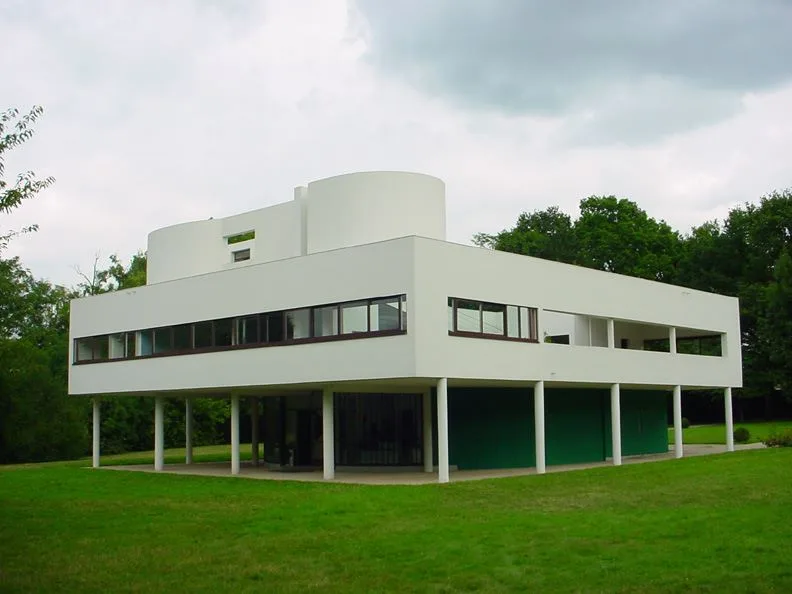 The white prism of the Villa Savoye raised on pilotis, with its horizontal ribbon windows
