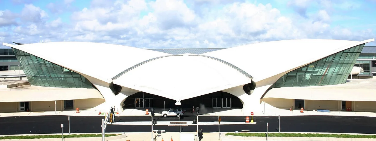 The wing-shaped curved reinforced-concrete shell roof of the TWA Flight Center, touching the ground at only a few points