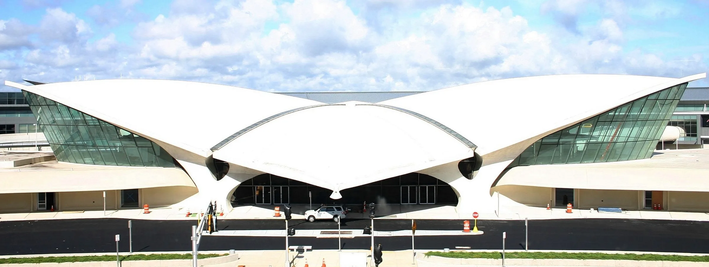 The wing-shaped curved reinforced-concrete shell roof of the TWA Flight Center, touching the ground at only a few points