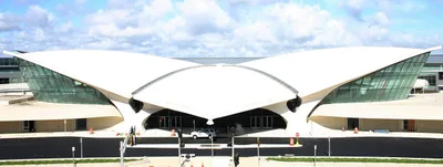 The wing-shaped curved reinforced-concrete shell roof of the TWA Flight Center, touching the ground at only a few points