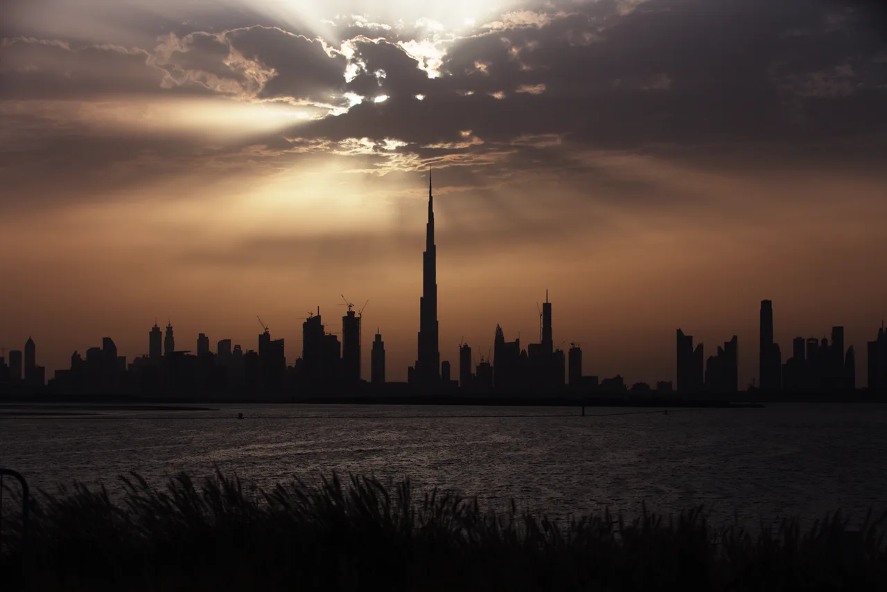 The stepped, spirally tapering mass of the Burj Khalifa rising over Dubai