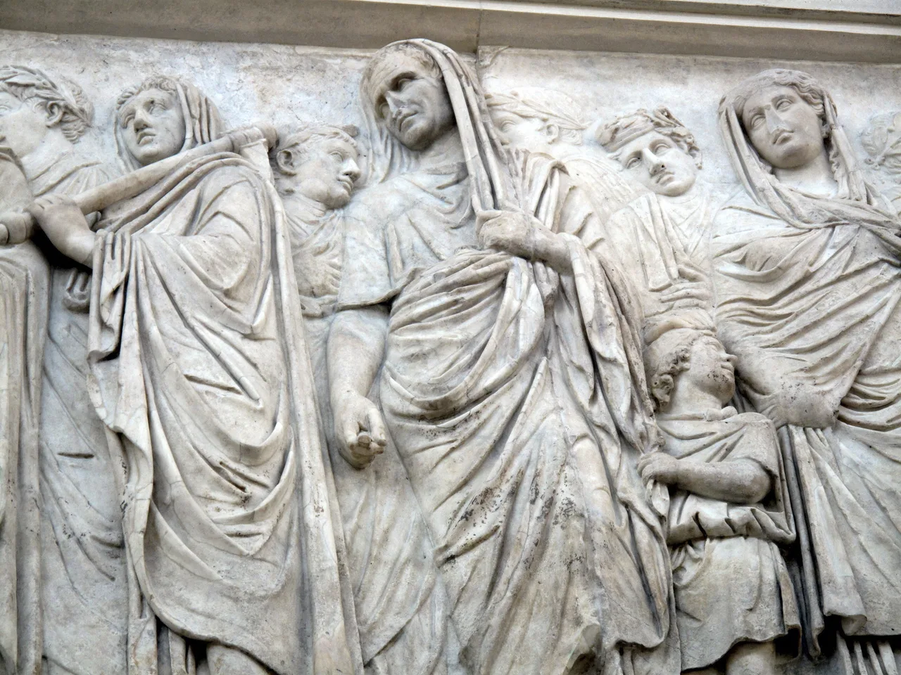 Processional relief on the Ara Pacis showing Roman aristocrats wearing togas