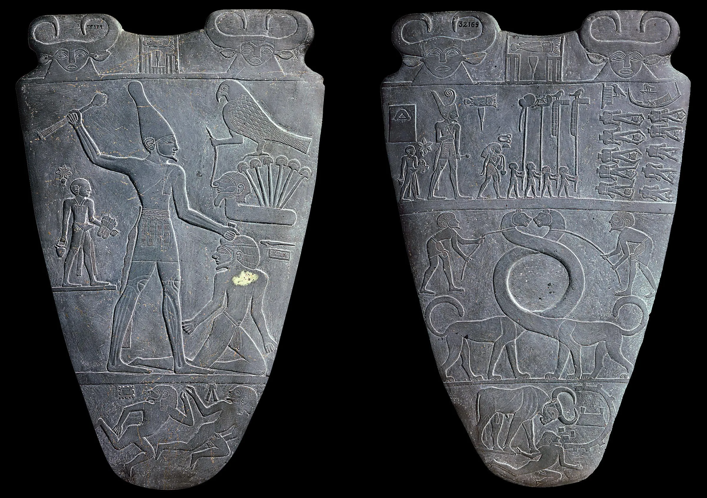 Both faces of the Narmer Palette: a siltstone relief showing the king clubbing an enemy and inspecting decapitated foes