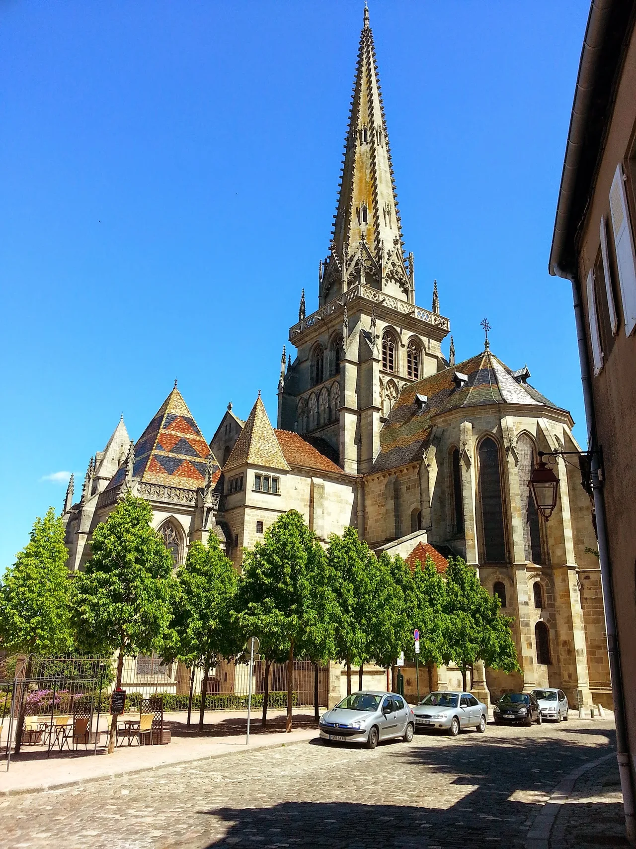 Western facade of Saint-Lazare cathedral in Autun: tall bell-tower and the great main portal whose tympanum carries the Last Judgment relief