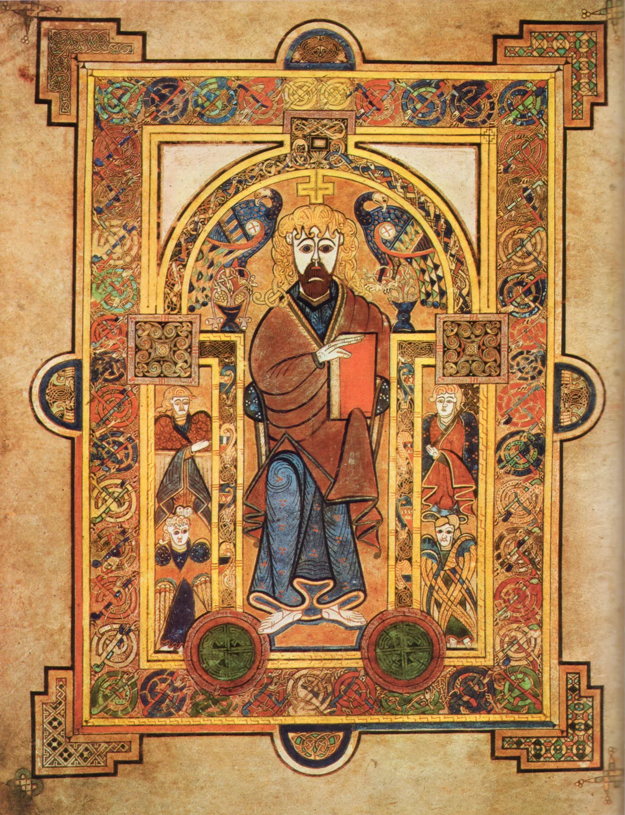 Folio 32v of the Book of Kells: Christ enthroned, with angels and a dense geometric frame