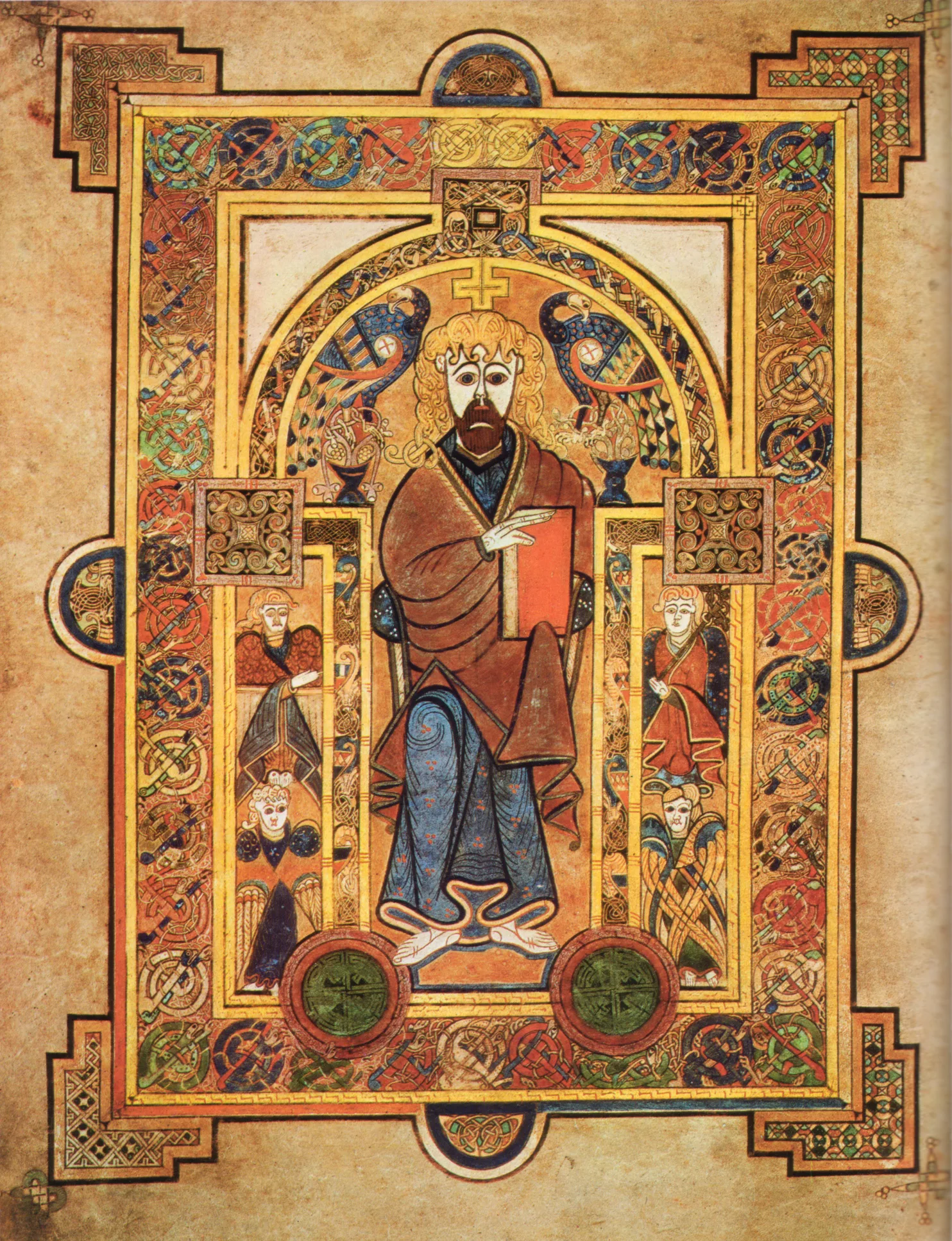 Folio 32v of the Book of Kells: Christ enthroned, with angels and a dense geometric frame