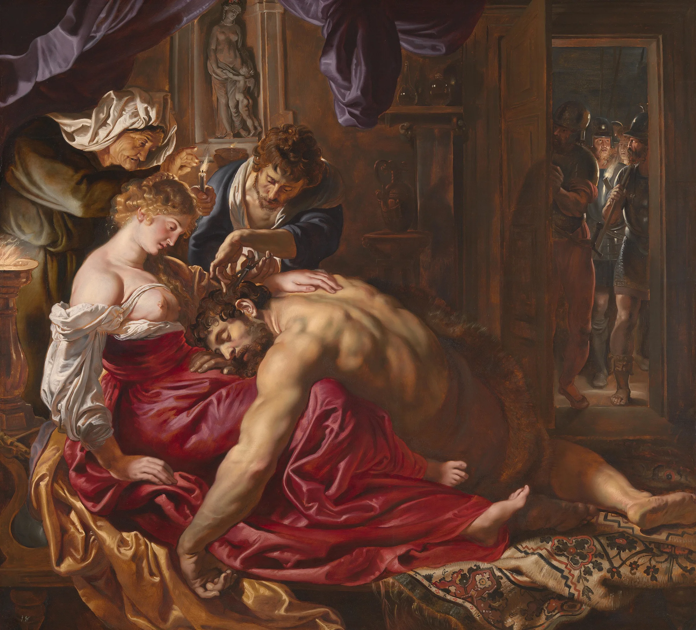 Rubens'in Samson ve Delila'sı: mum ışığında Delila'nın kucağında uyuyan kaslı Samson'ın saçını bir hizmetkâr keserken, kapıda bekleyen askerler