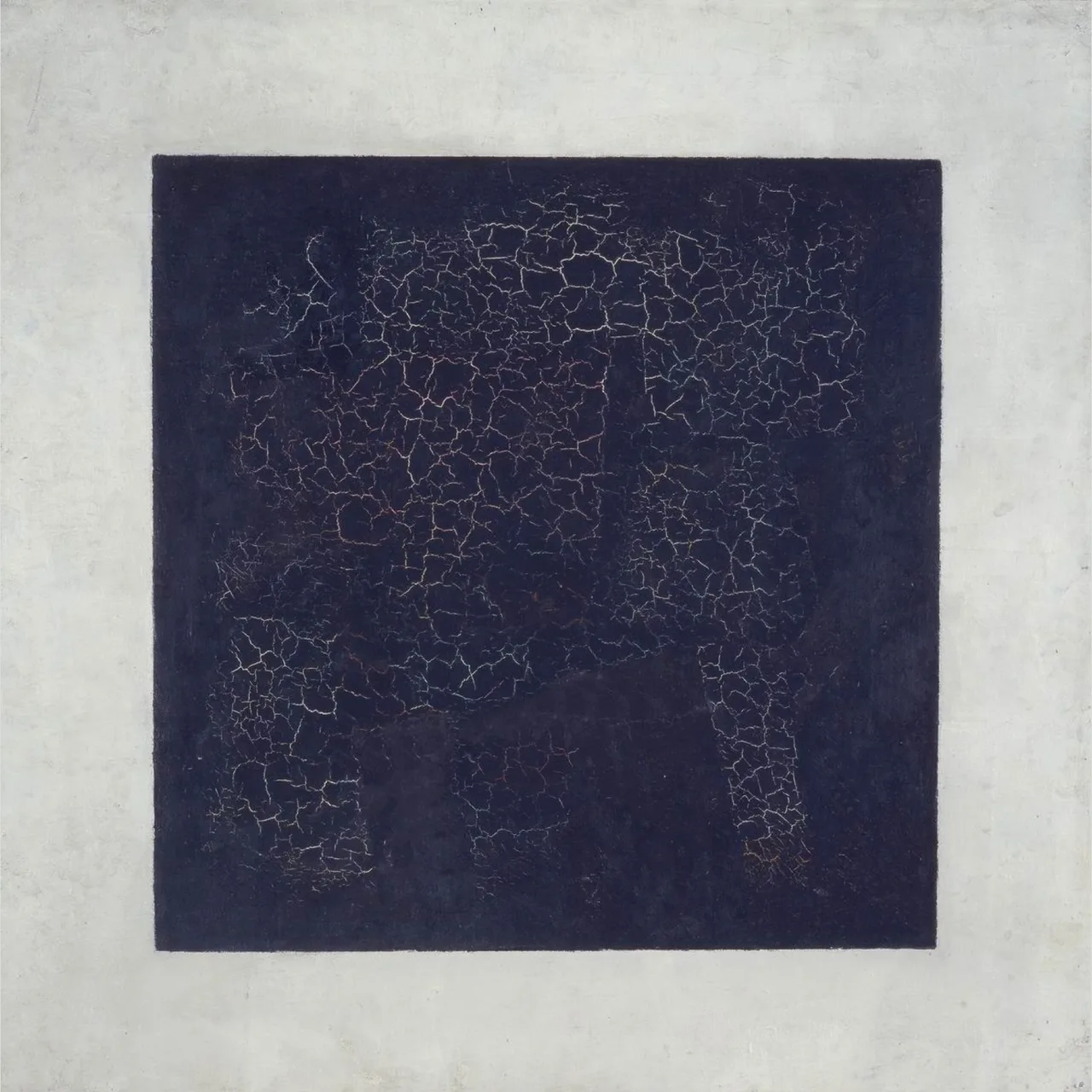 Malevich's Black Square: a roughly brushed black square on a white canvas, edges slightly cracked