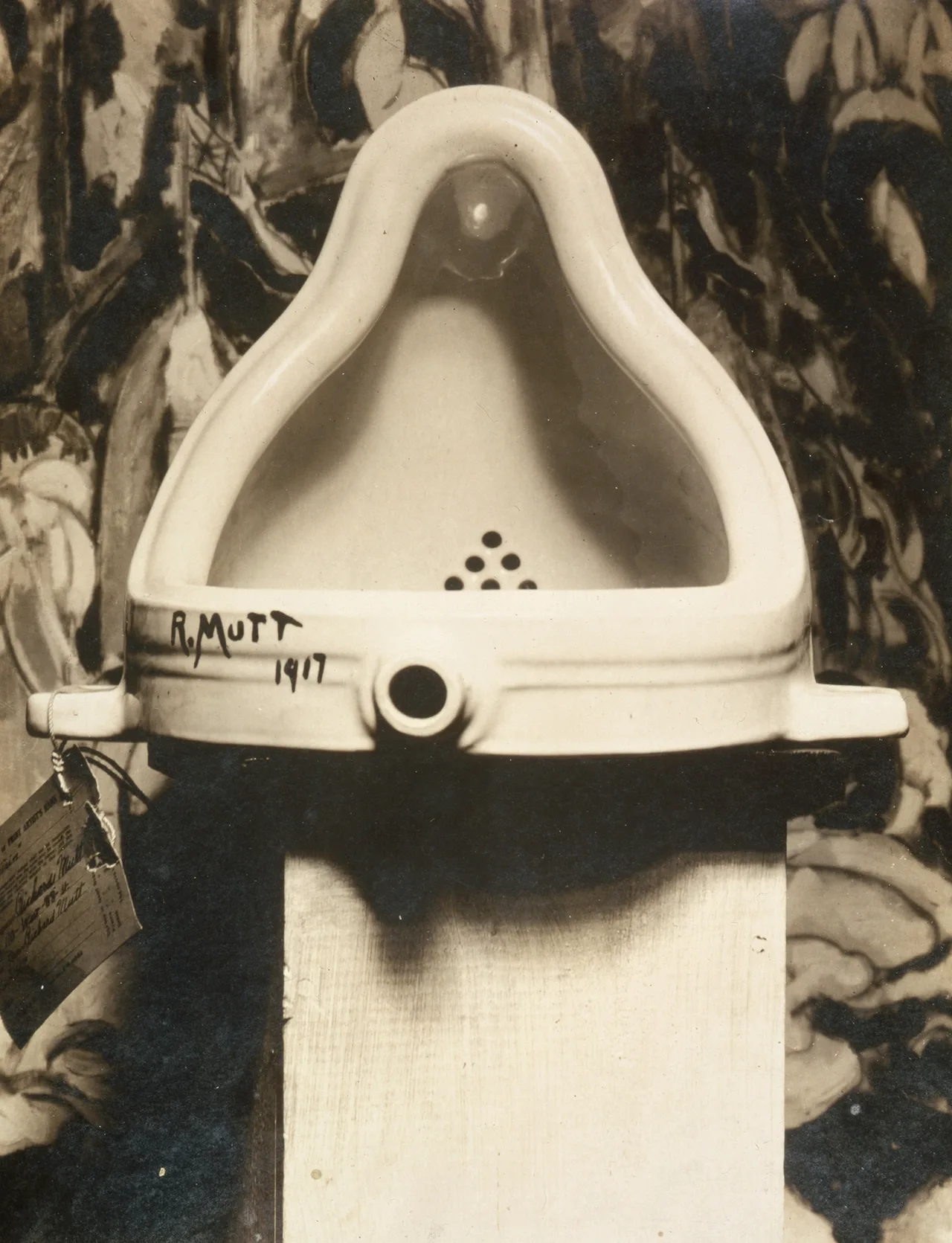 Duchamp's Fountain: a porcelain urinal placed horizontally, signed 'R. Mutt 1917'