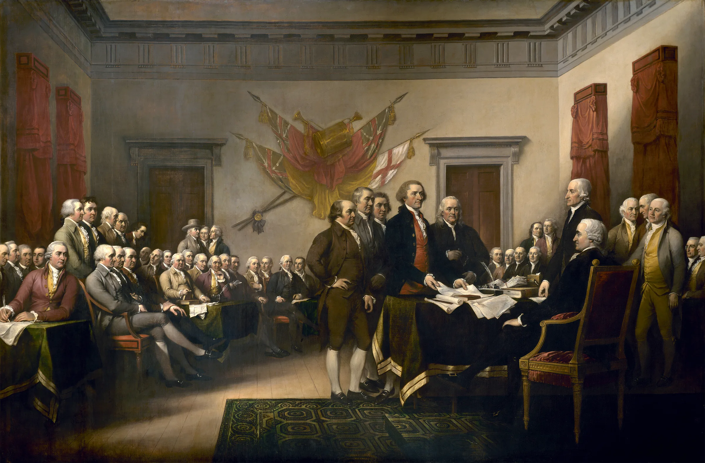 John Trumbull'ın 1818 tablosu: beş kişilik taslak komitesi, taslağı Kıta Kongresi başkanı John Hancock'a sunarken — bugün ABD Kongre Rotonda'sında