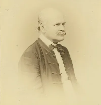 Portrait of Ignaz Semmelweis: a nineteenth-century physician with a short beard in a dark coat