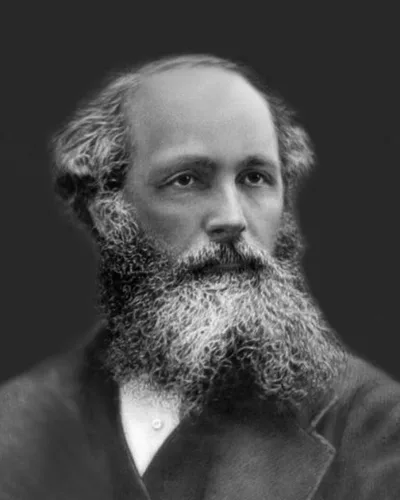 A nineteenth-century photograph of James Clerk Maxwell: dark suit, short beard, a calm man holding a coloured disc