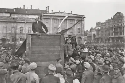 Lenin addressing troops bound for the Polish front at Sverdlov Square in Moscow, 5 May 1920; Trotsky and Kamenev are visible to the right of the platform