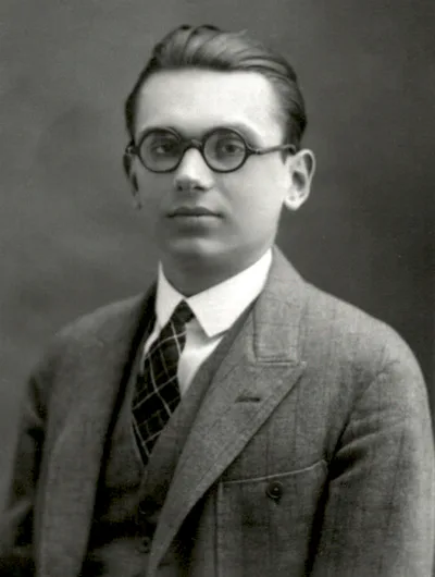 A black-and-white portrait of a young Kurt Gödel: fine features, round glasses, a dark suit and bow tie; looking directly at the camera