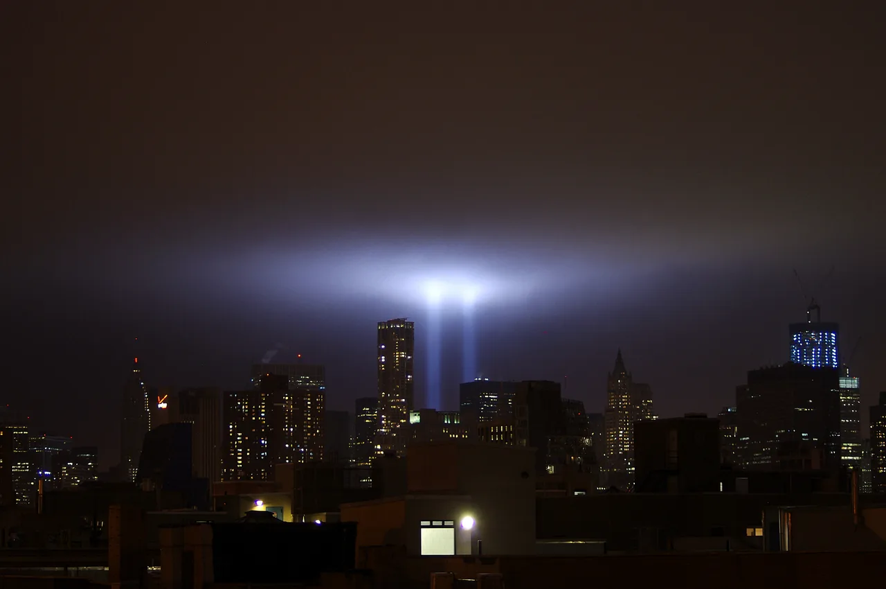 Two vertical blue beams rising into the sky over New York on the night of 11 September 2011: the Tribute in Light