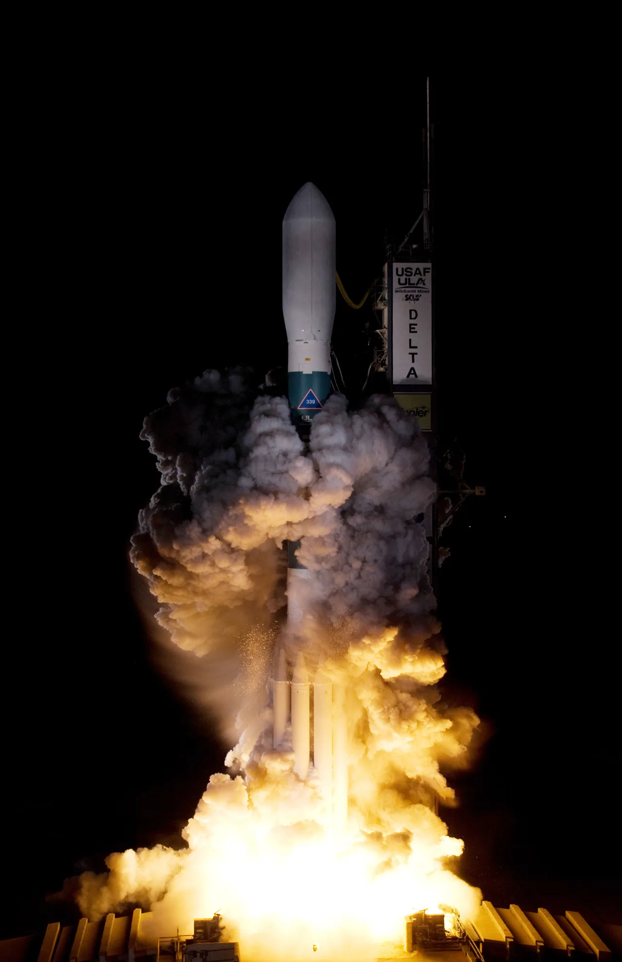 A Delta II rocket carrying Kepler lifts off at night from Pad 17-B at Cape Canaveral, its exhaust cloud lit by the engines