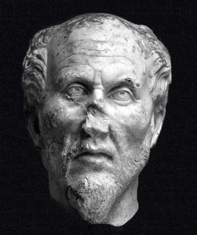 A marble head identified with Plotinus — broken through the neck and across the middle, restored, with austere features; Ostiense Museum, Ostia Antica