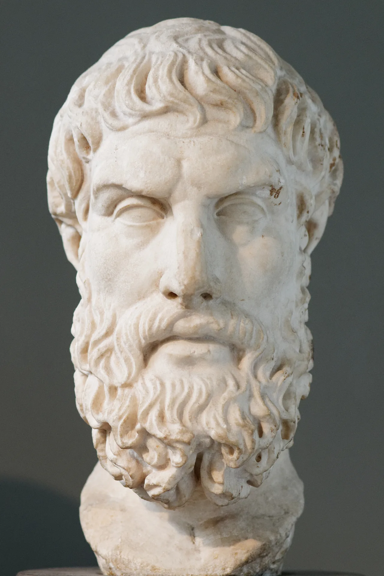 Marble bust of Epicurus — a bearded older man, head slightly turned, in the British Museum
