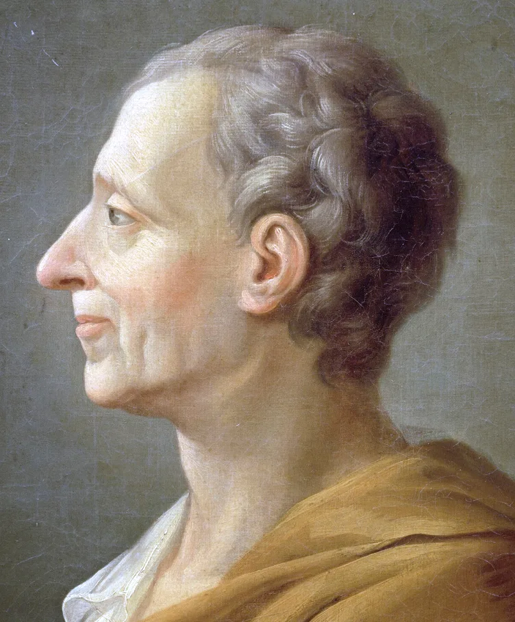 An eighteenth-century portrait of Montesquieu: an aristocrat with long white wig, red velvet coat, and a paper held in his left hand