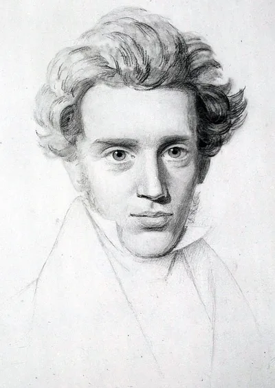 A 19th-century portrait of Søren Kierkegaard: a young man with a stiff collar, unruly hair, looking to one side
