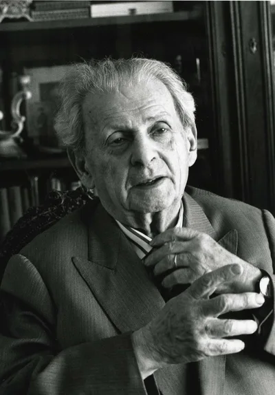 A photograph of Emmanuel Levinas: an elderly, thoughtful man with glasses