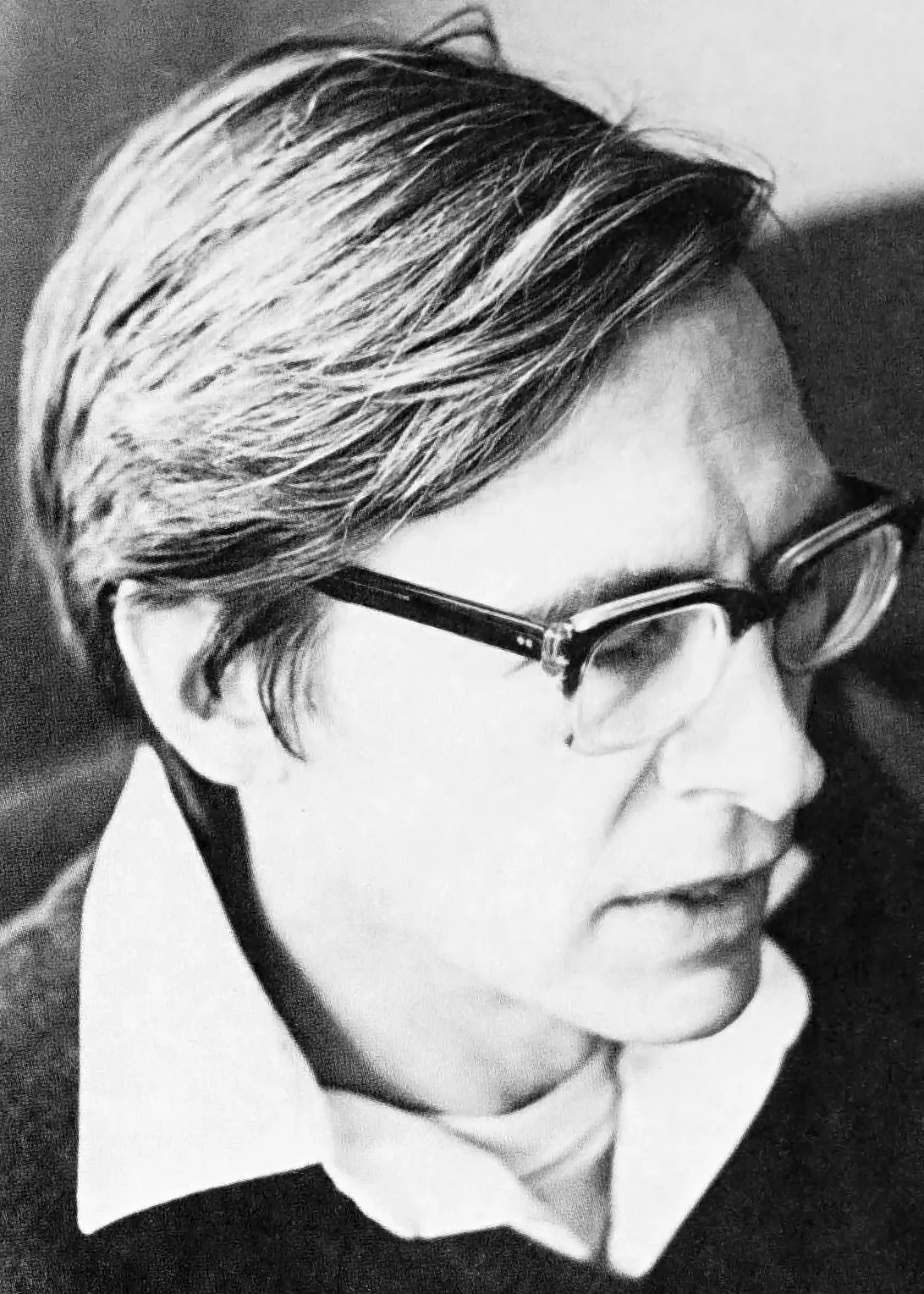 Portrait photograph of John Rawls, 1971: a calm, bespectacled, middle-aged academic in a suit