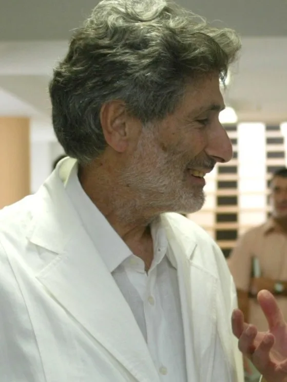 Portrait of Edward Said in Seville in 2002 — grey-bearded, wearing glasses, with an attentive look