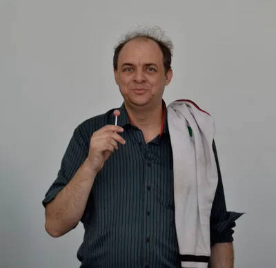 A photograph of Graham Harman speaking at the Museum of Contemporary Art of Barcelona (MACBA)